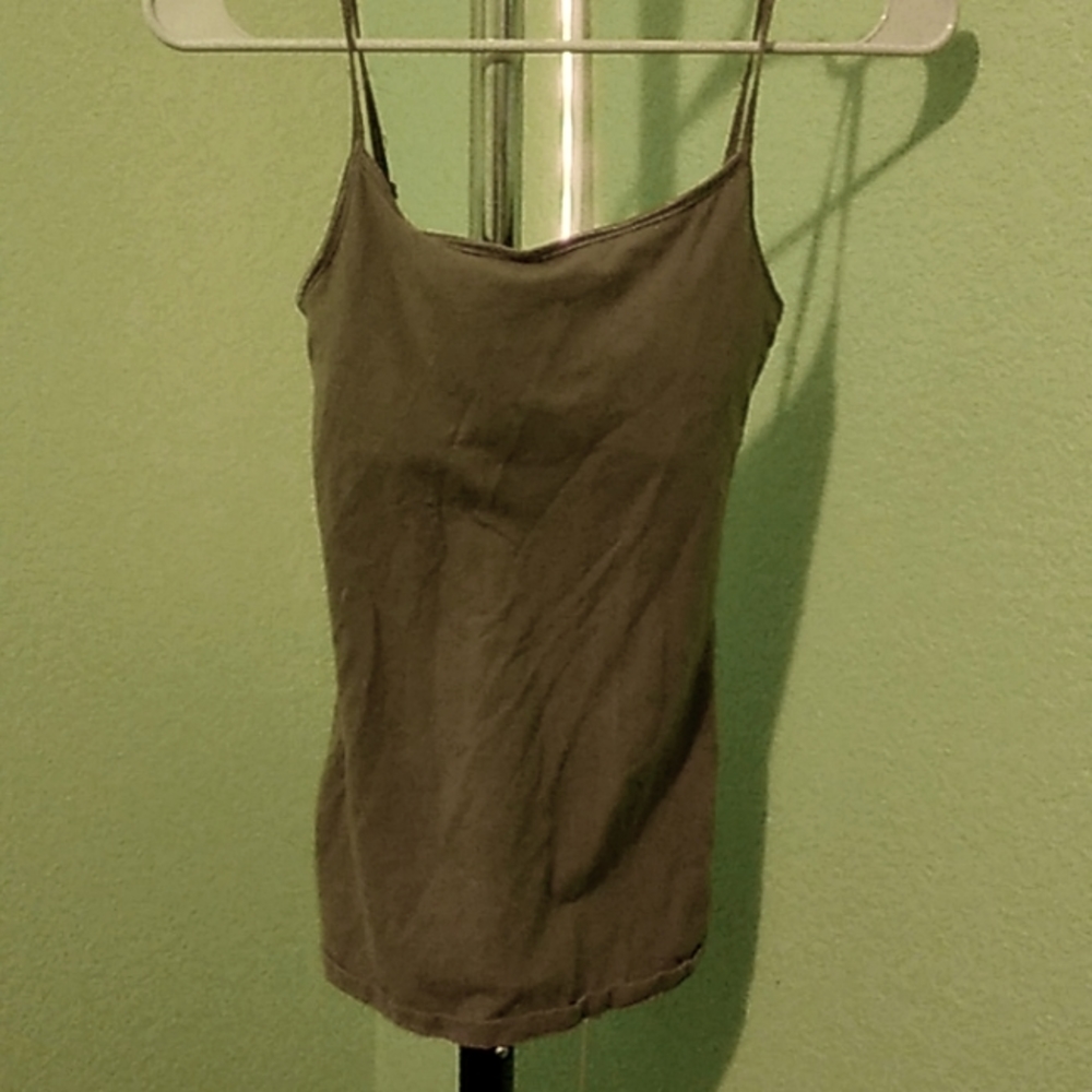 A green tight bodyied tanktop with padding